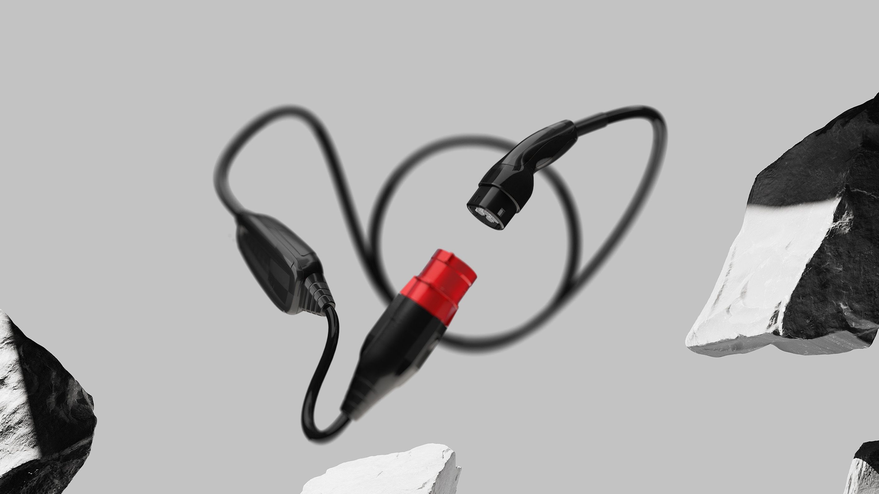 Mobile Ladestation POWER2Go Kabel zwischen Gesteinsbrocken