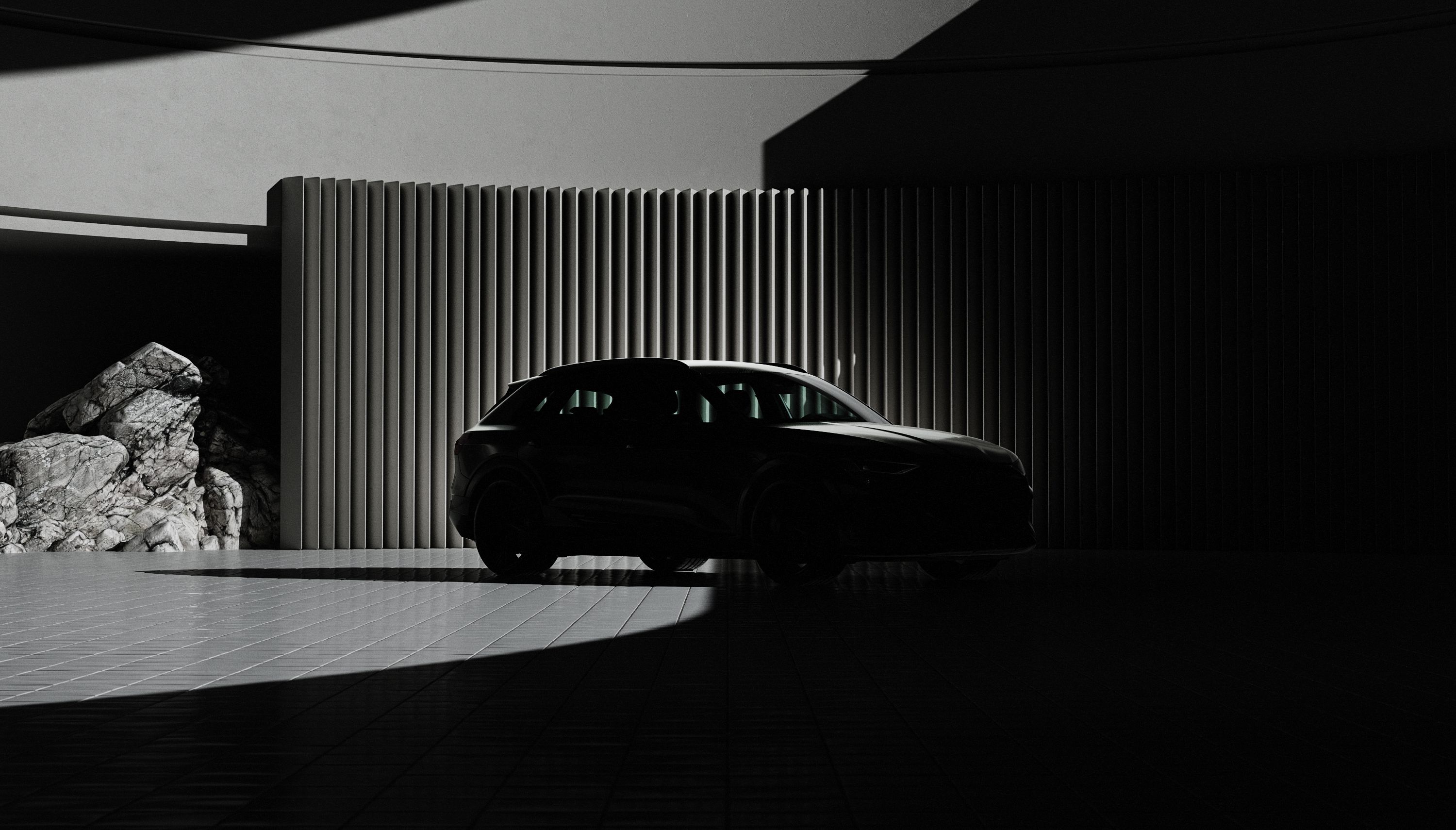 Auto steht vor einer Wand